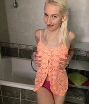 Blonde wife teasing in the bathroom