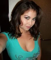Busty babe does not mind showing off her goods on camera