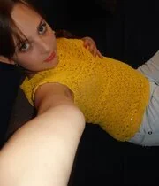 Smiling babe taking nude selfies