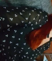 Beautiful redhead showing off her new tattoos after fully stripping