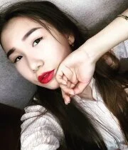 Cute Asian beauty having some fun with her phone camera