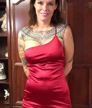 Lady In Red Feasts On Rock-Solid Cock