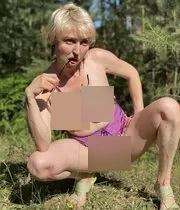 MILF posing in backyard for me