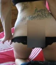 Tattooed girl showing her amazing pussy and tits