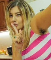 Blonde amateur with big tits teases with her hairy armpits