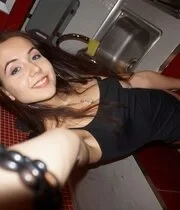 Nerdy cutie having some fun with the camera while home alone