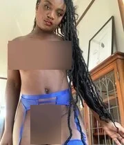 Amateur black girl showing off her new blue lingerie