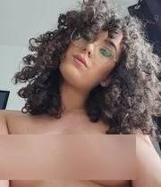 My curly haired GF loves taking nude selfies