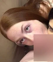 Two amateur girls having a threesomes on the couch