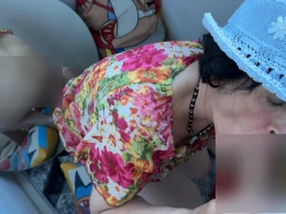 Kinky brunette granny drops down on her knees to suck a dick