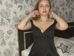 Natural brunette in black stockings fingering her cunt