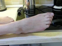 Showing off my feet before fingering my tight love tunnel
