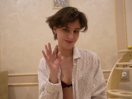 Skinny brunette masturbating with banana