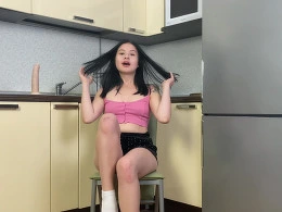 Teen in need of sex masturbates with Dildo in the kitchen