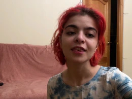 Sexy redhead with tattoos wears socks and toys her slit