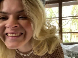 Cute blonde fooling around on the bed teasing your hard cock