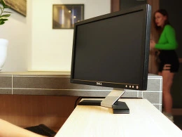 Receptionist fucks with a client