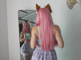 Cute pink haired girl jerks a dick with rhe tits and sucks it