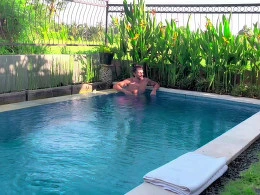 Small tits babe having some fun in the pool