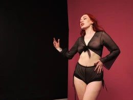 POV blowjob with a photographer and a redhead model
