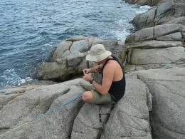 Guy enjoys the view while fucking his GF by the seas