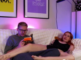 Redhead chick interrupts her BFs reading to fuck him on the couch 👀🍒