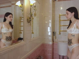 Tattooed Woman Masturbating in the Bathroom